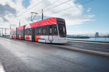 Die ersten Niederflurbahnen könnten serienmäßig ab Sommer 2023 über die Kennedybrücke fahren. (Fotomontage: Skoda/Stadtwerke Bonn)